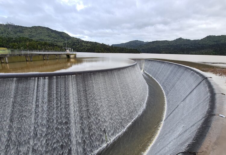 Image of lower nihotupu dam overflowing in september 2021